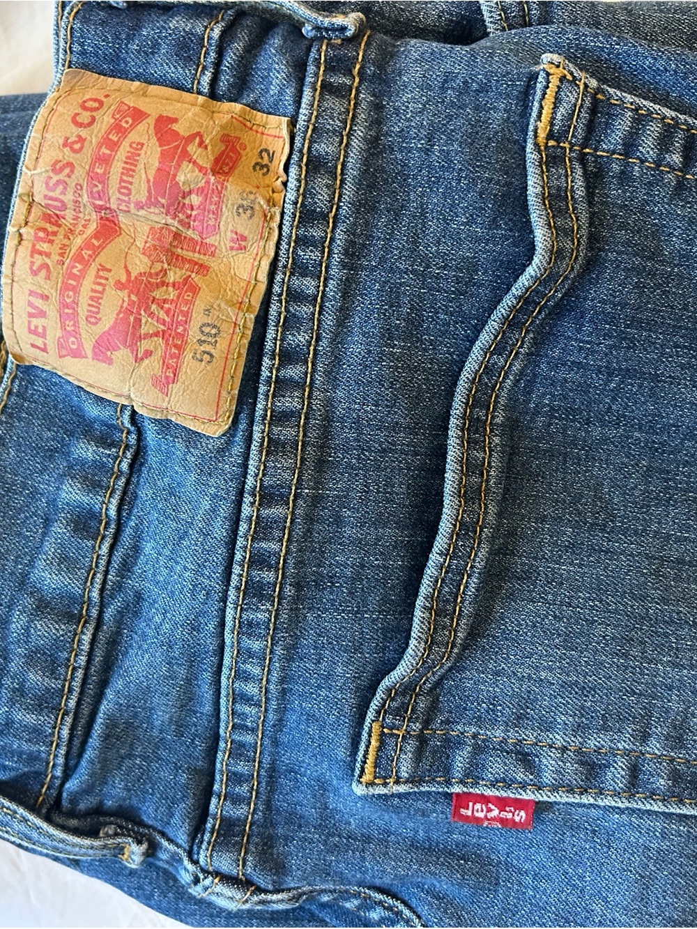 Levi's Men's Blue Slim Straight Jeans with Tan Patch